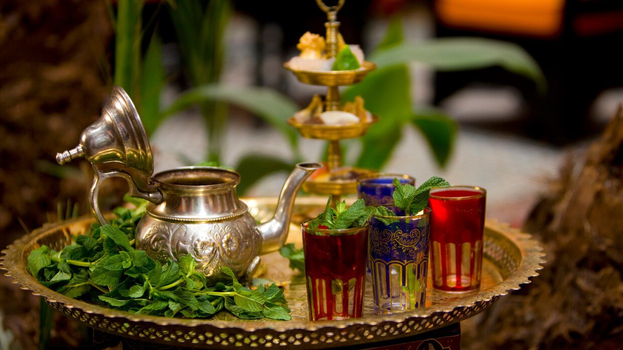 Moroccan hospitality pouring mint tea